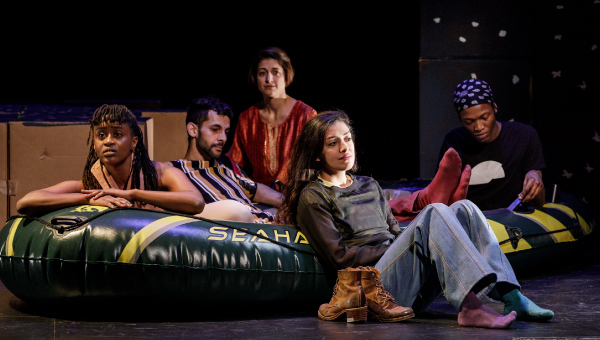 A group of people sitting on the floor in a bloat float.