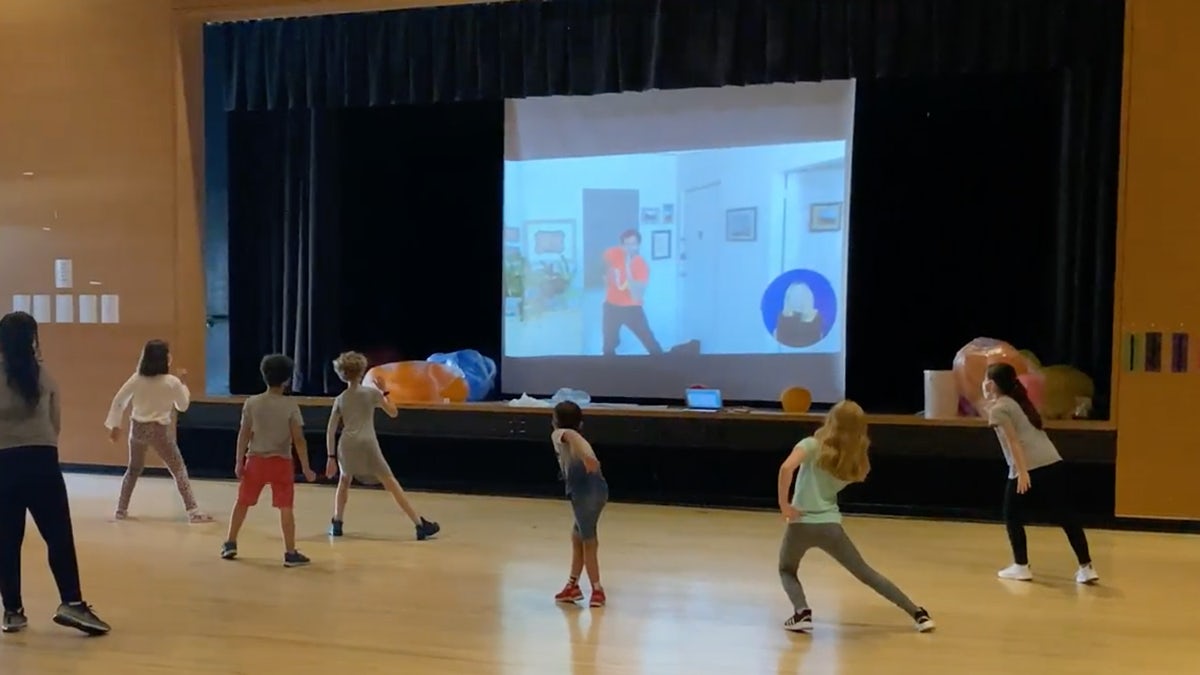 Kids participating in New Victory Education Virtual Partnership