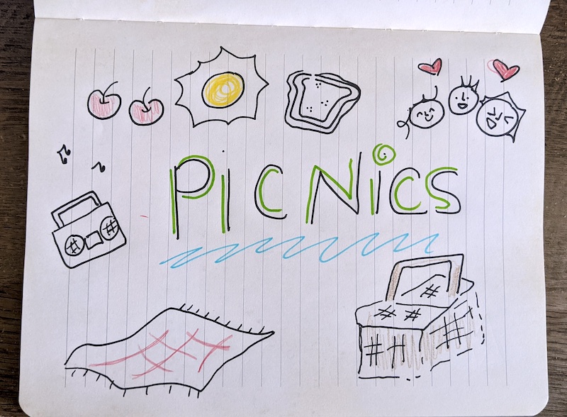 A drawing of the word PICNICS
