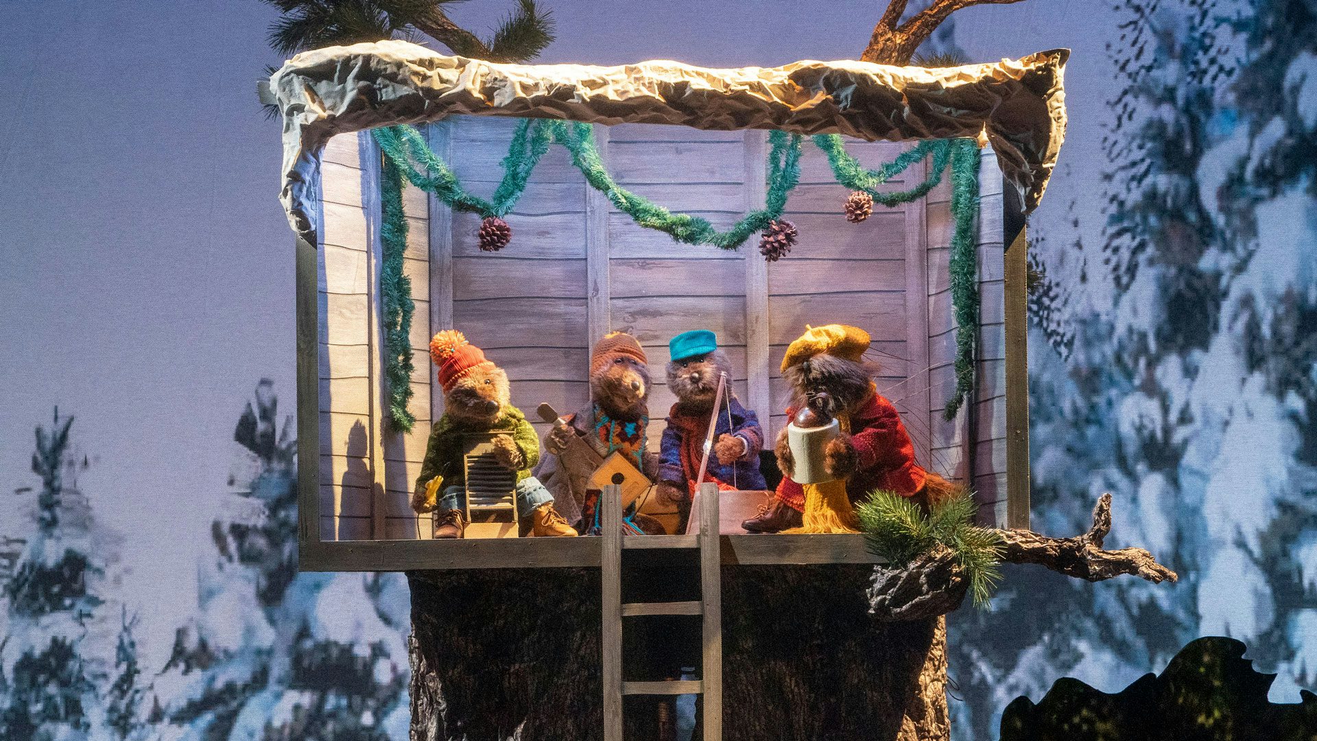 Emmet Otter's Jug-Band puppets playing instruments.