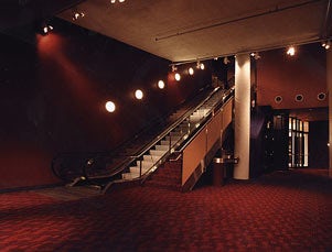 Empty lobby with escalator and stairs