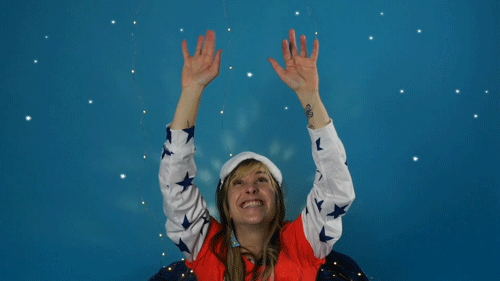 Elen stretches her arms overhead and wiggles her fingers at the stars