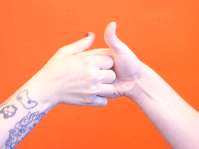 Two hands engaged in a thumb war against an orange background