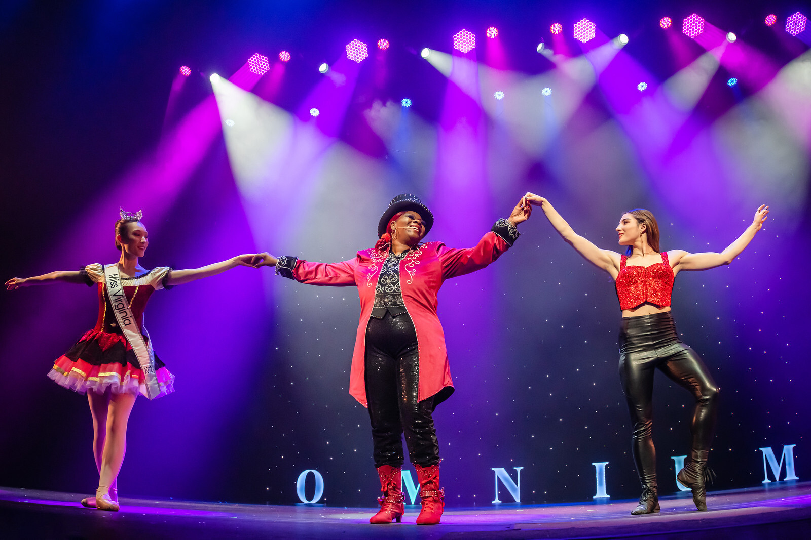 Image of I'mPossible ringmaster Danette Sheppard-Vaughn with other cast members