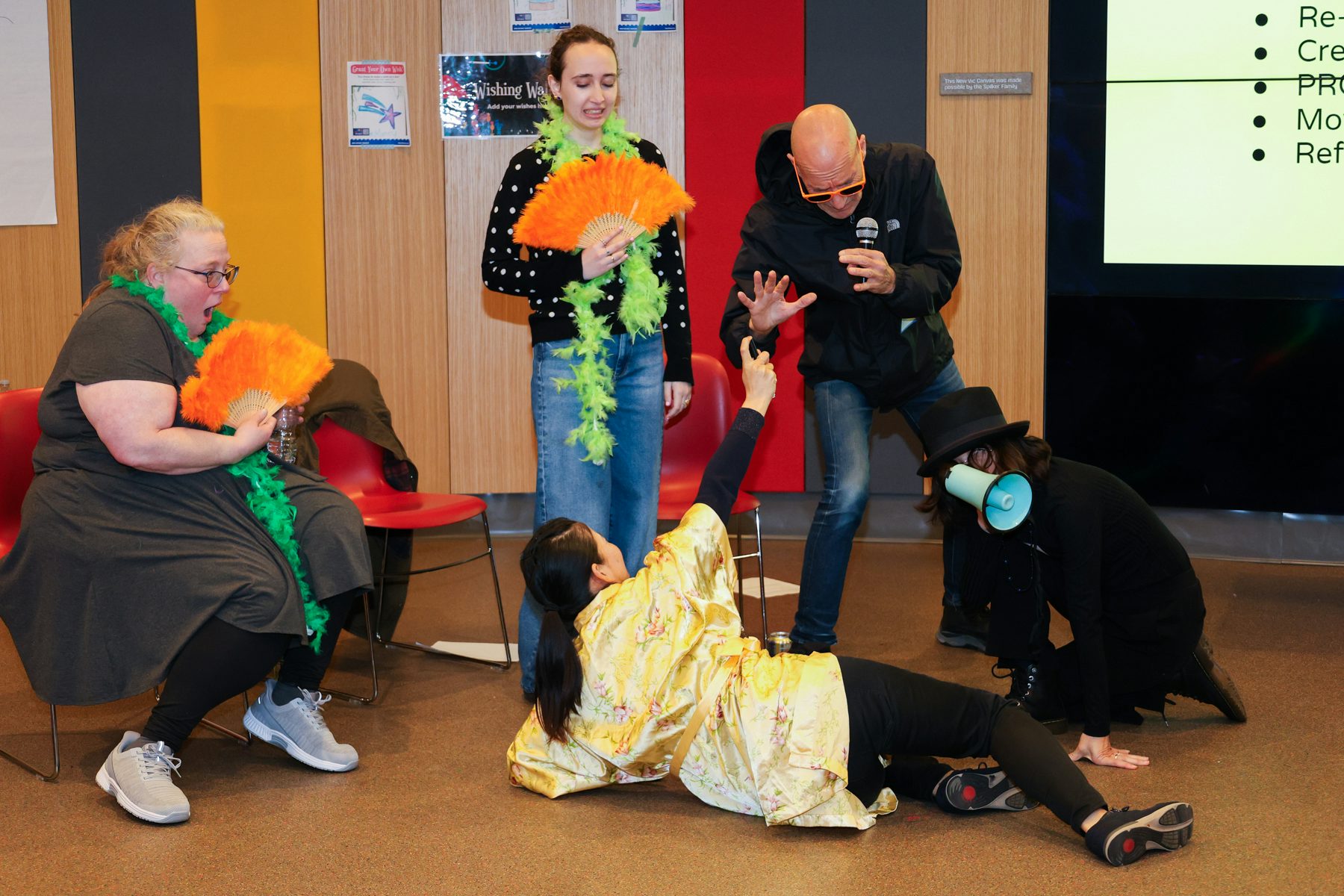 Teachers and teaching artist performing a skit.