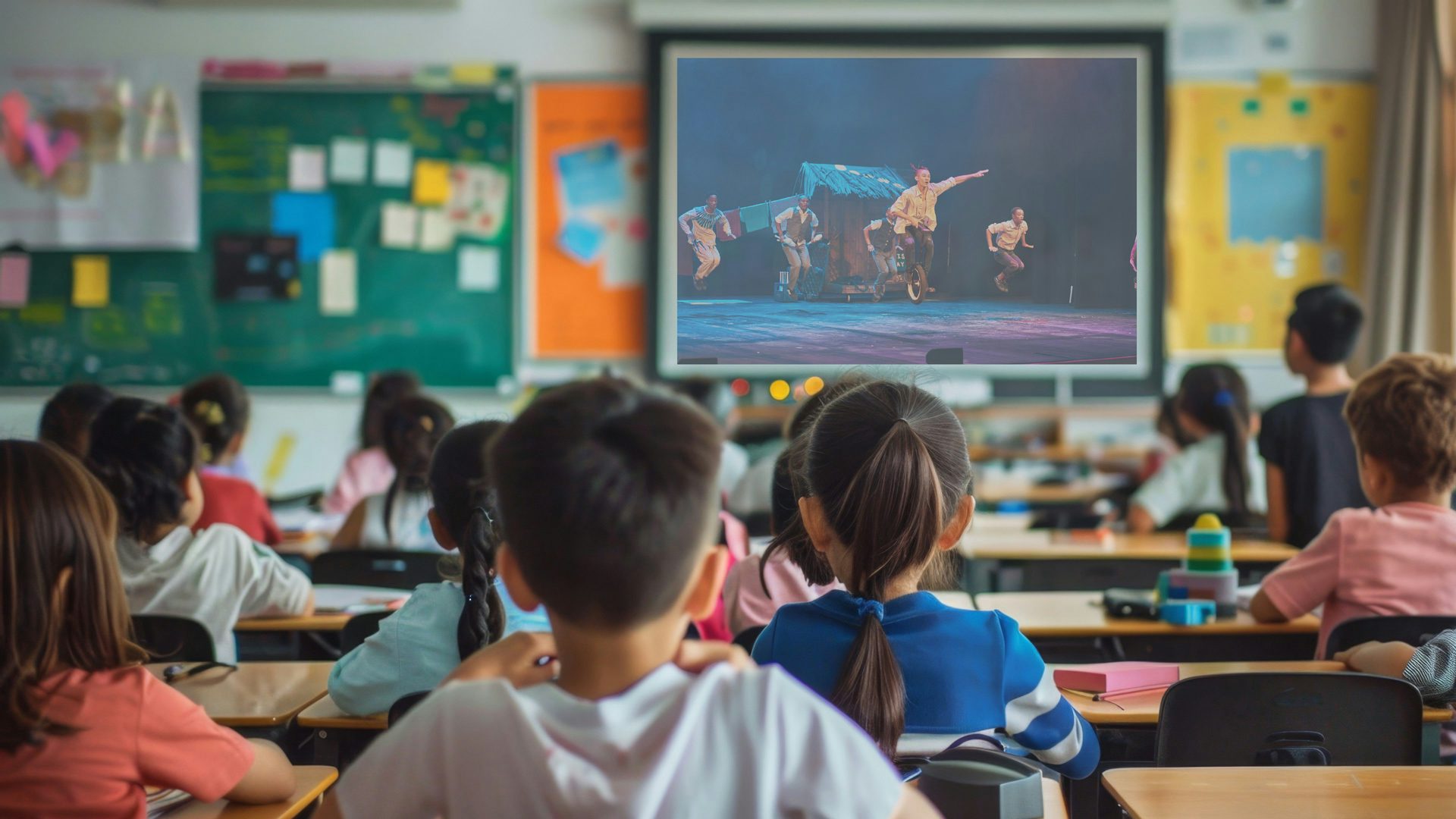 A classroom watching a digital version of a new victory performance.